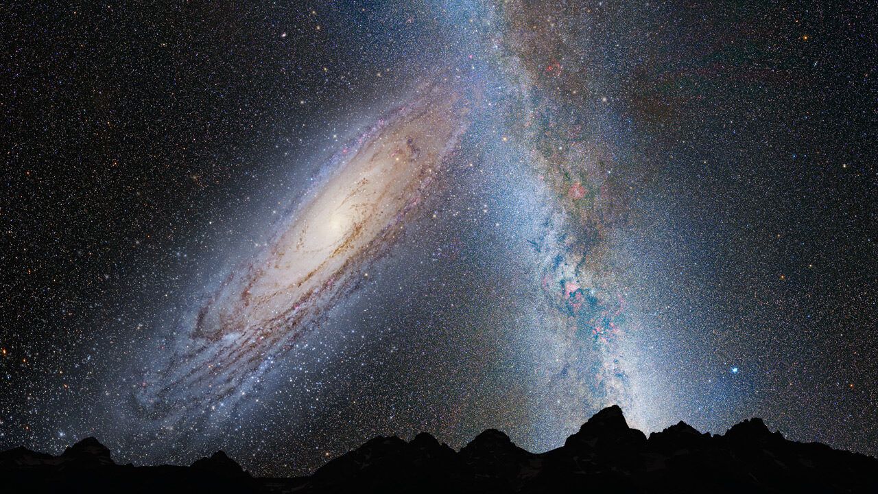The Milky Way and Andromeda over the mountains